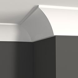 Close up of crown moulding and a dark grey wall