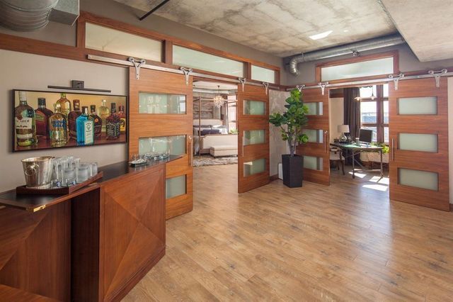 There is a bar in the middle of the room.