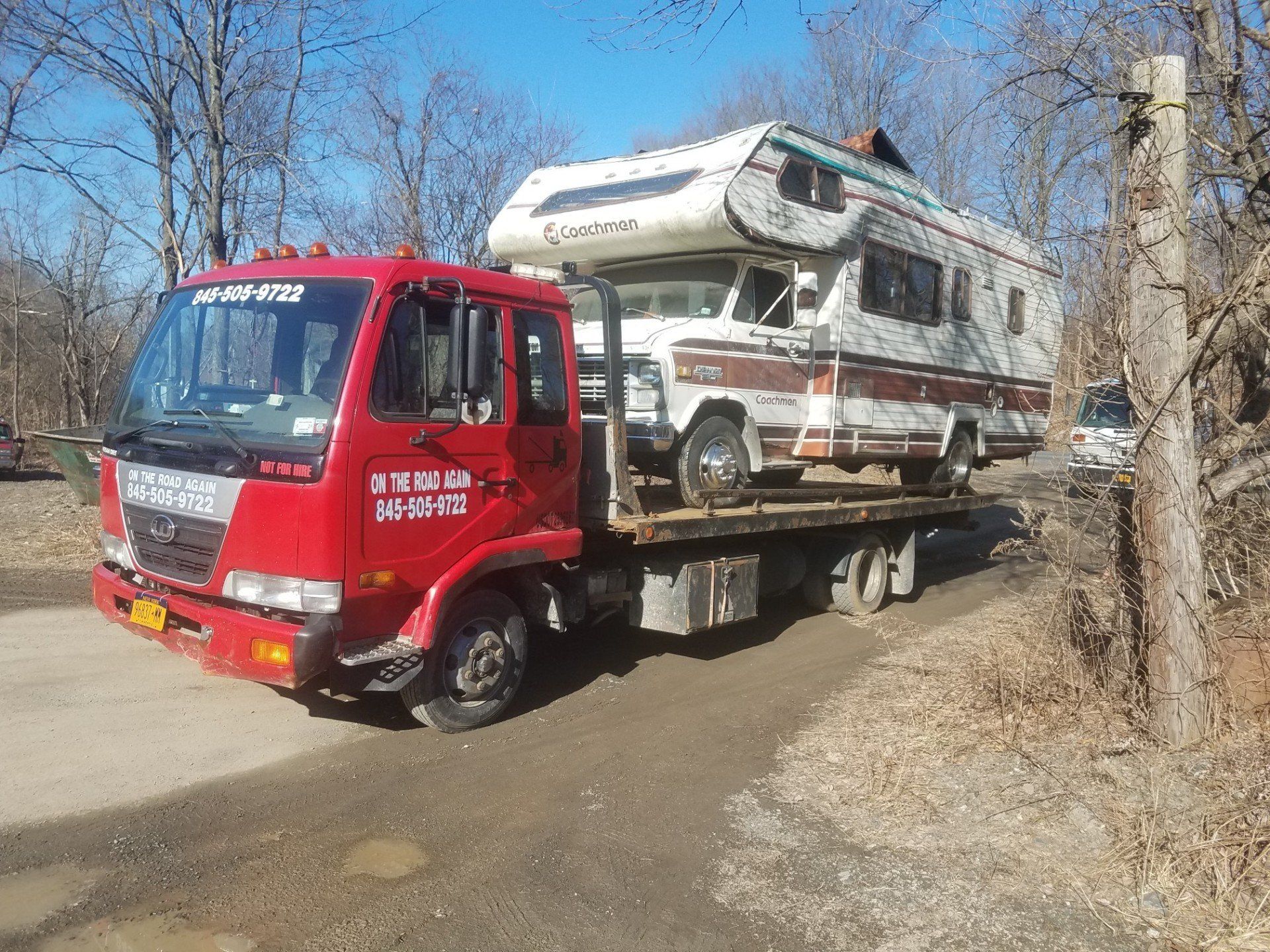 Tow Truck Towing a Broken Scooter — Wallkill, NY — On the Road Again Towing
