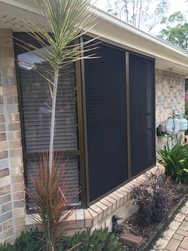 A House With A Screen Door On The Side Of It — Screen Factory In Murwillumbah, NSW