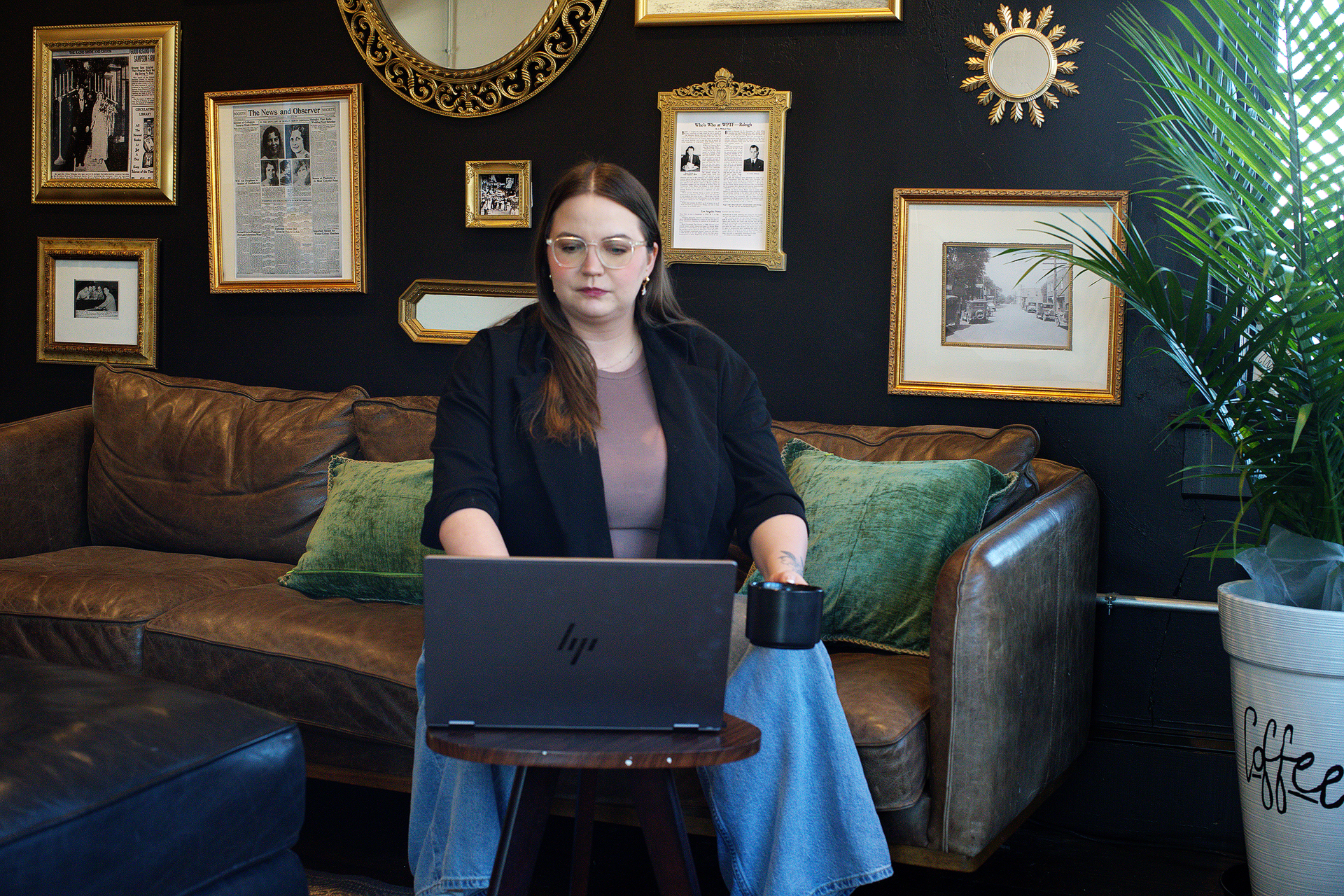 Sophie owner of Sprout Web Services LLC working on computer