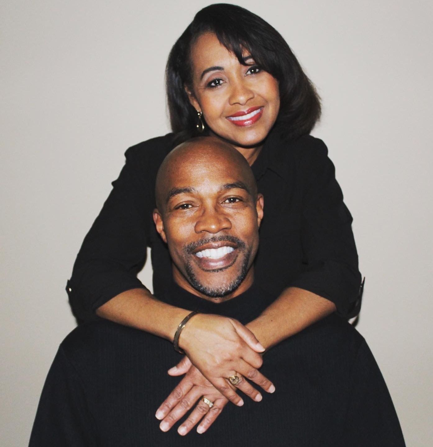 Women - Family Dental Practice in Liverpool, NY Two friends holding each other while smile into a camera.