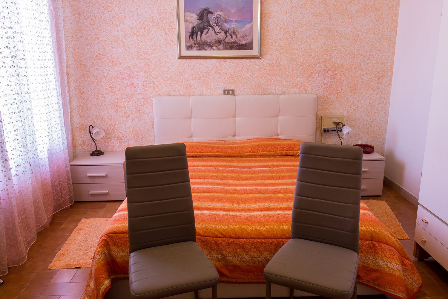 hotel room with colored walls