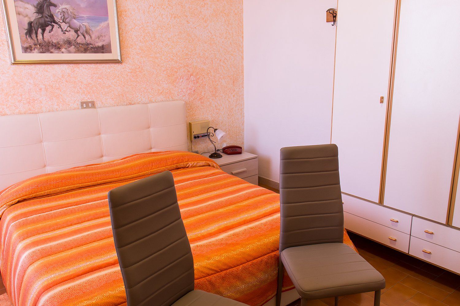 hotel room with colored walls