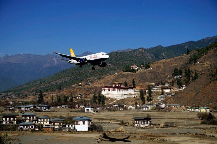 Drukair - The national flag carrier of Bhutan taking off from Paro, the only International Airport in Bhutan