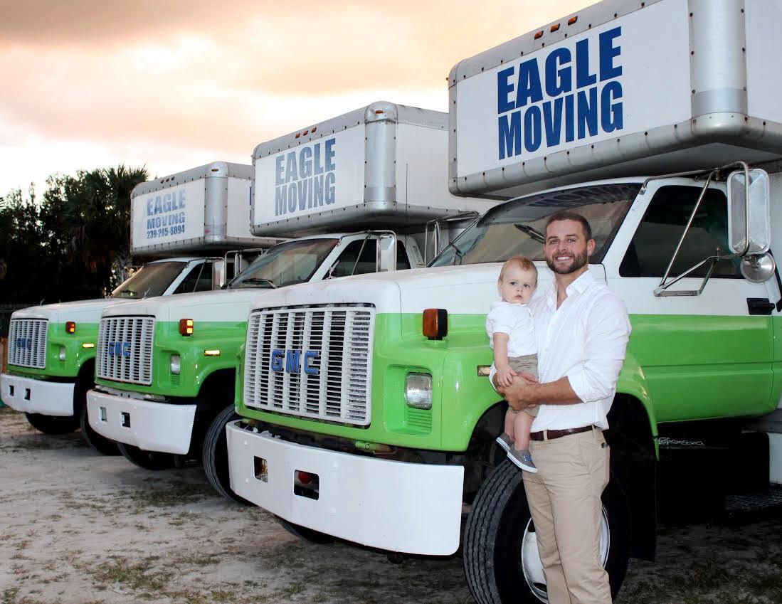 Owner Holding a Baby — Fort Myers, FL — Eagle Moving
