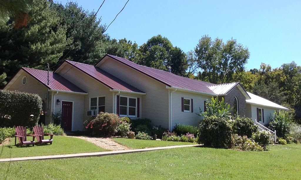 After House with Red Roof — Kingsport, TN — McClain Roofing and Siding