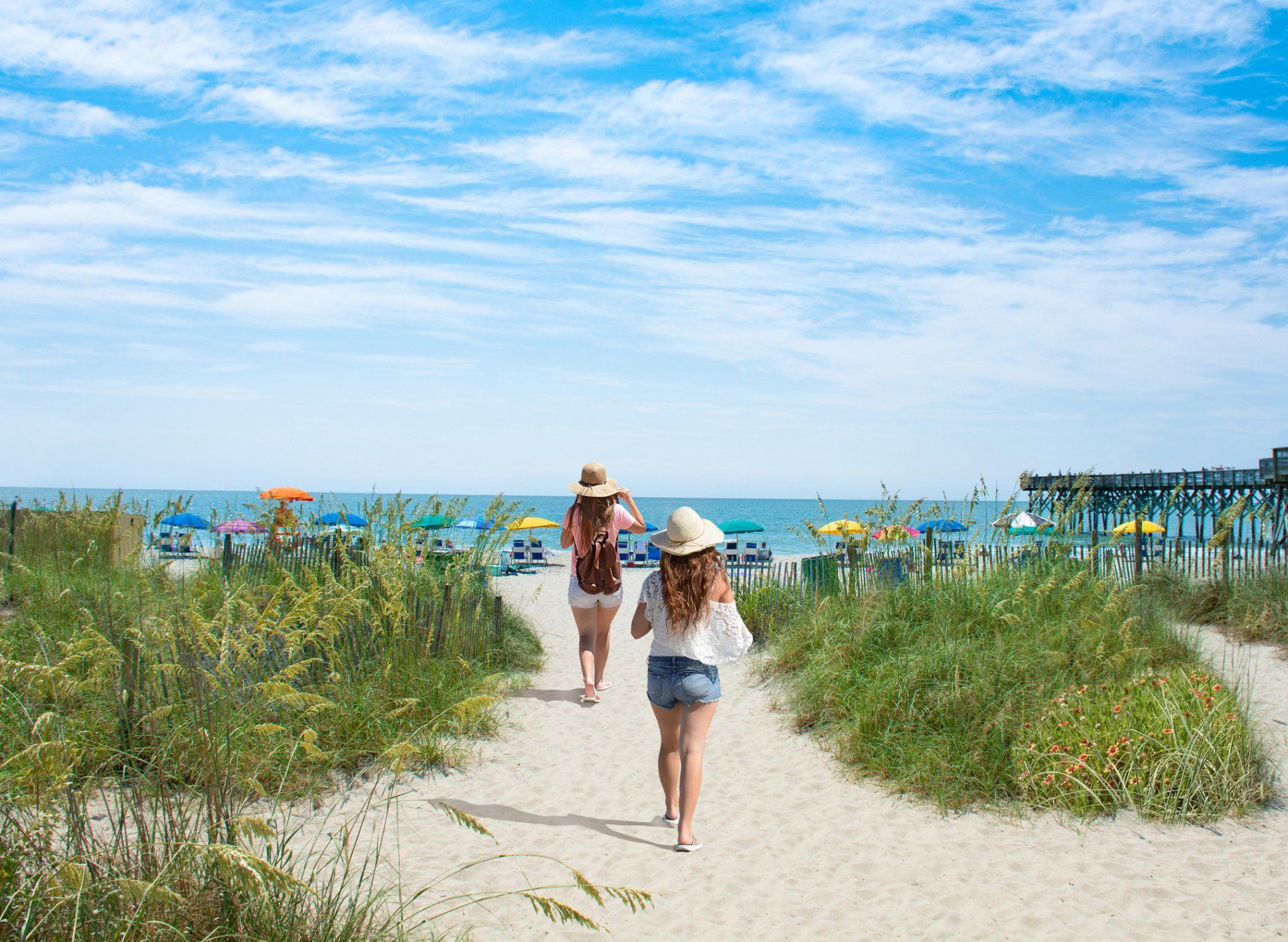 Girls waking On The Beach — Hilton Head Island, SC — Island Life Property Services