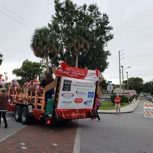A parade float with a sign that says police on it