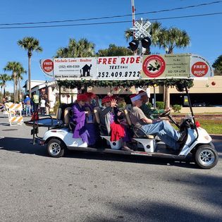A golf cart with a sign that says free ride