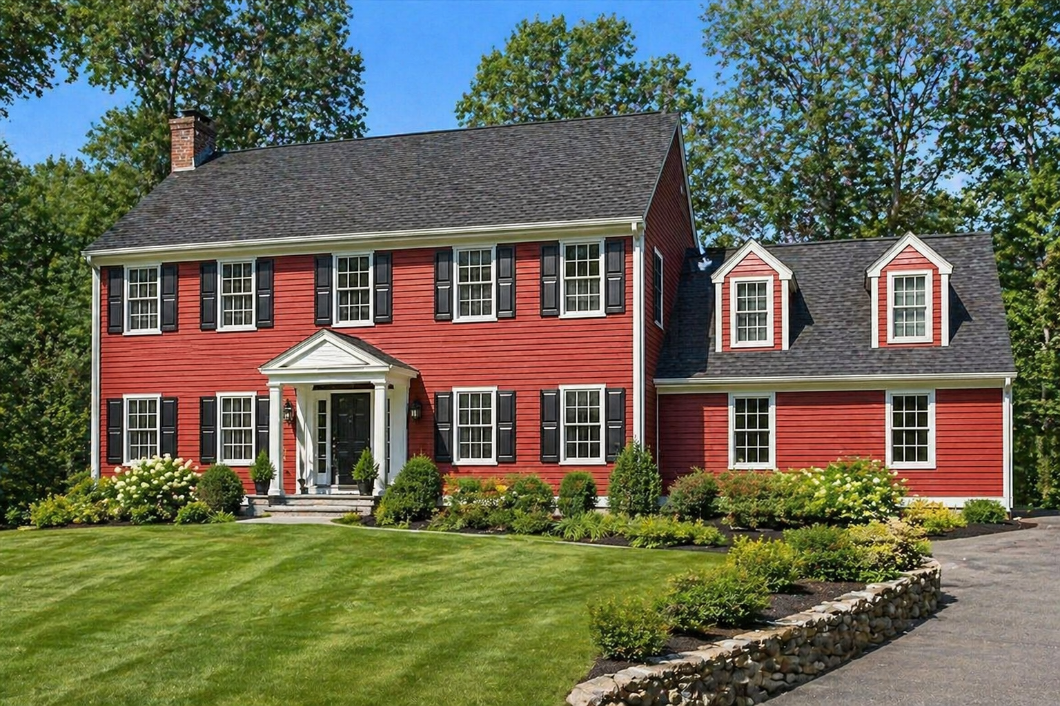 Technician performing air duct cleaning in Concord MA home with attic and basement HVAC systems