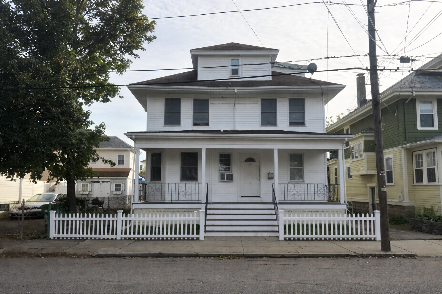 Dryer vent cleaning to remove lint from two dryer vent exhausts at two-family home in Cambridge, MA