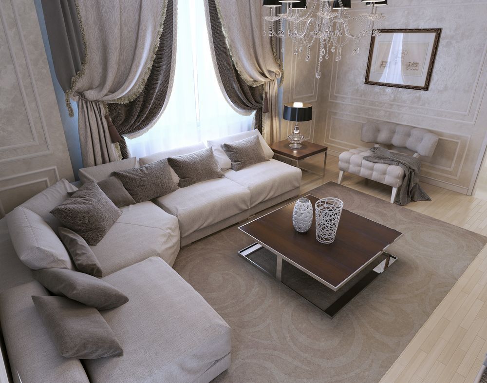 Elegant Living Room With a Sectional Sofa, Coffee Table, and Patterned Rug — Ocean Charm Upholstery In Southport, QLD