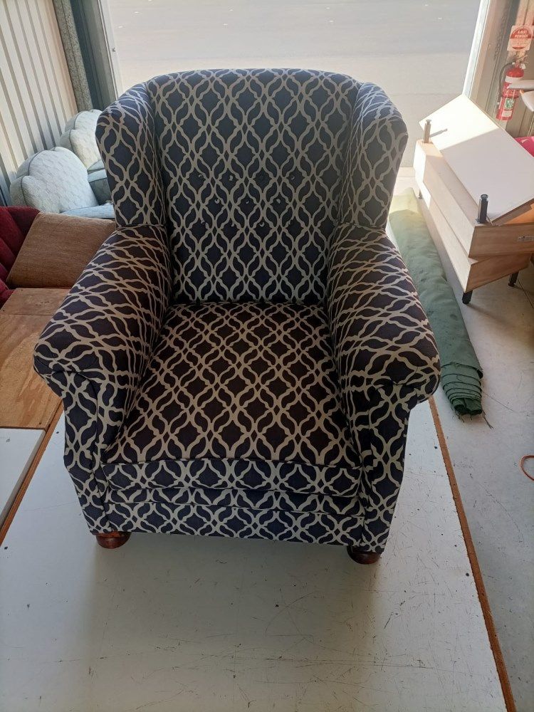 A Chair With A Pattern On It Is Sitting On A Table  — Ocean Charm Upholstery In Southport, QLD