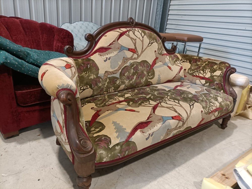 A Couch With A Bird Pattern On It Is Sitting In A Room  — Ocean Charm Upholstery In Southport, QLD