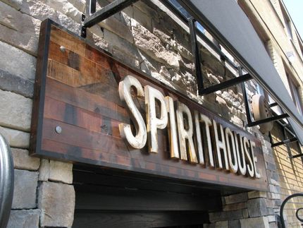 A wooden sign that says spirithouse on it