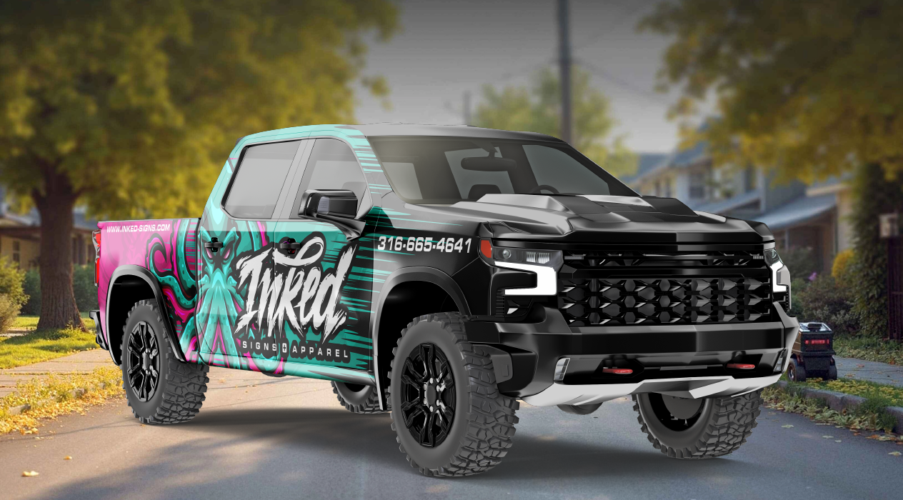 A truck with a wrap on it is parked on the side of a road.