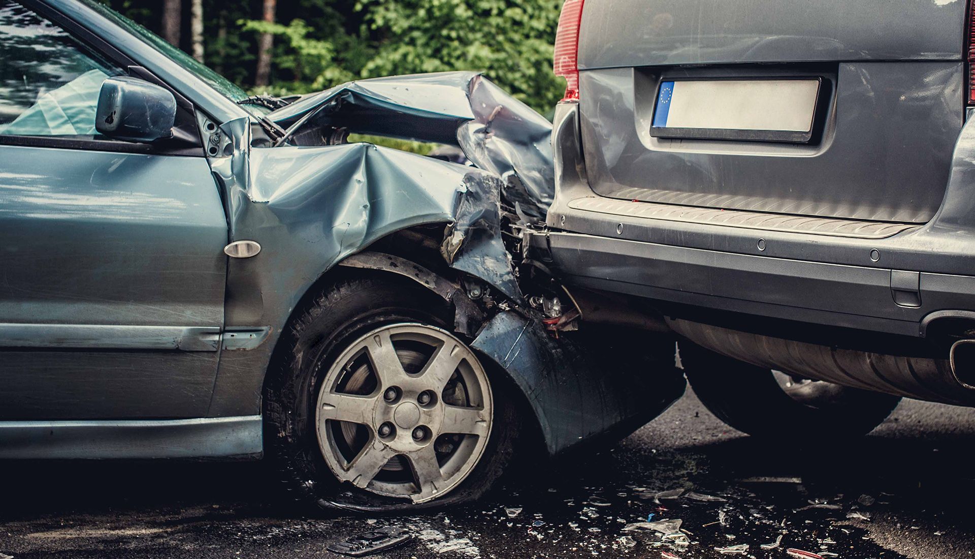 A car and a suv are involved in a car accident.