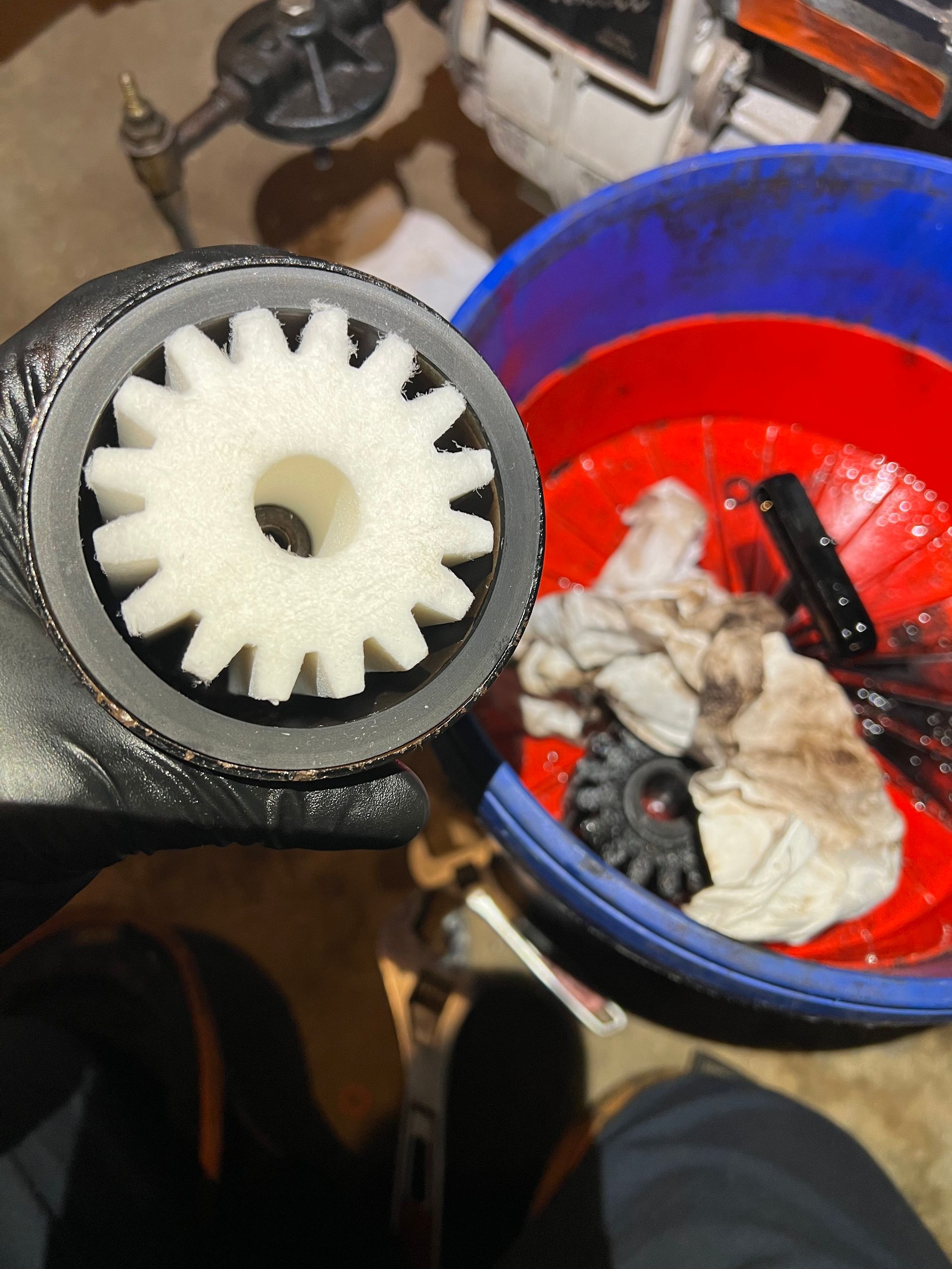 A man is fixing an air conditioner on the wall.