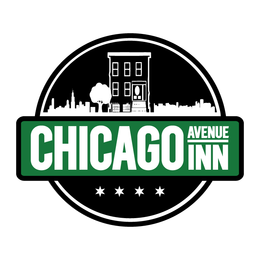 A close up of a chicago avenue inn logo on a concrete surface.