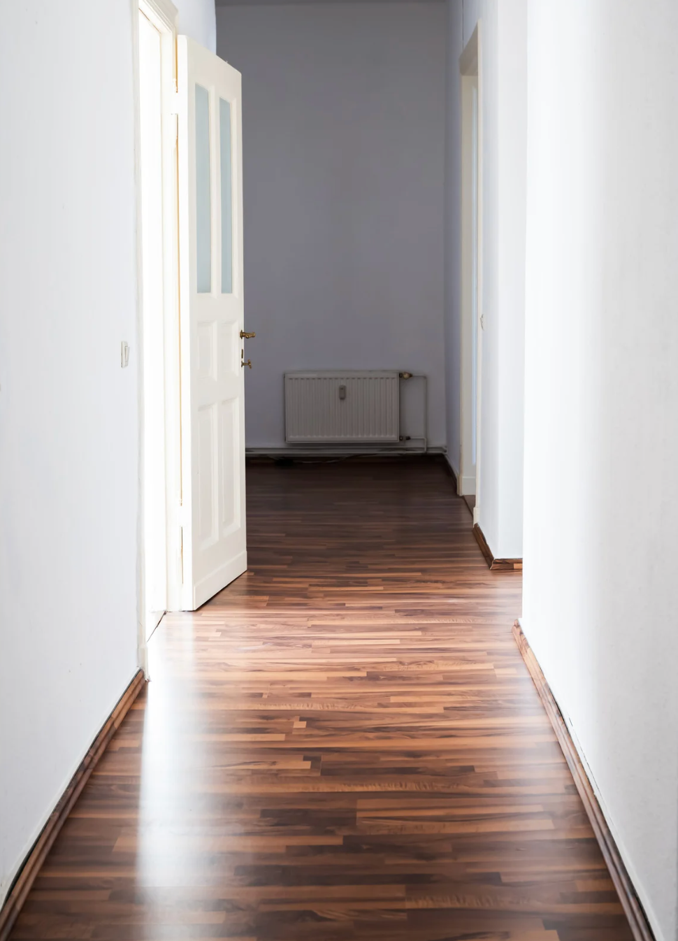 Clean, empty hallway after professional junk removal service.