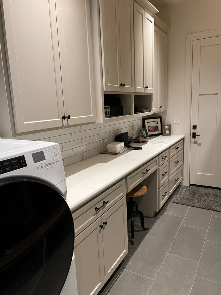 There is a washer and dryer in the laundry room.