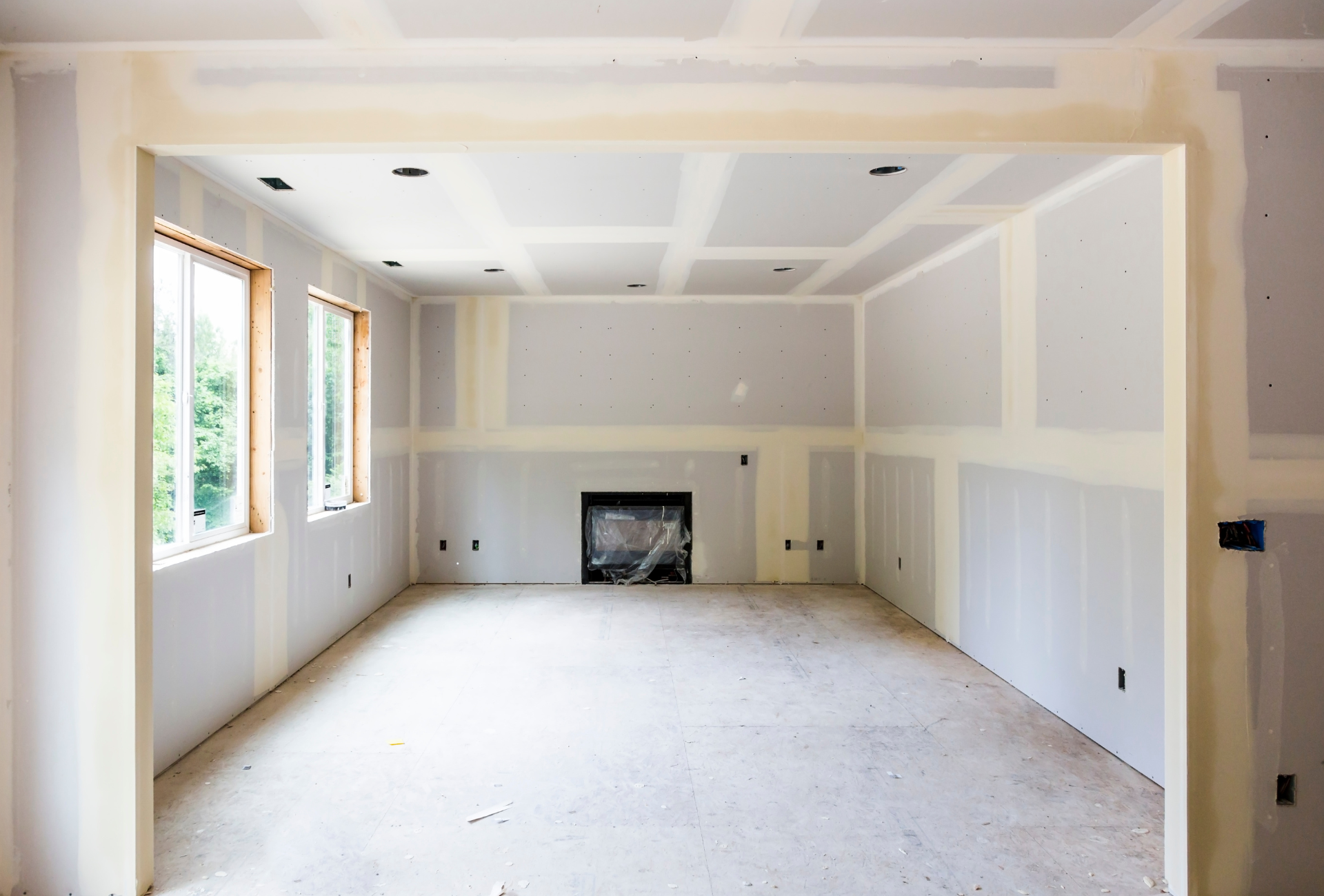 There is a fireplace in the middle of the room.