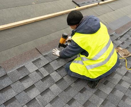 Man Installing a Tile Roof — Fort Wayne, IN — All-Weather Exteriors