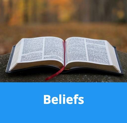 A bible is open to a page that says beliefs.