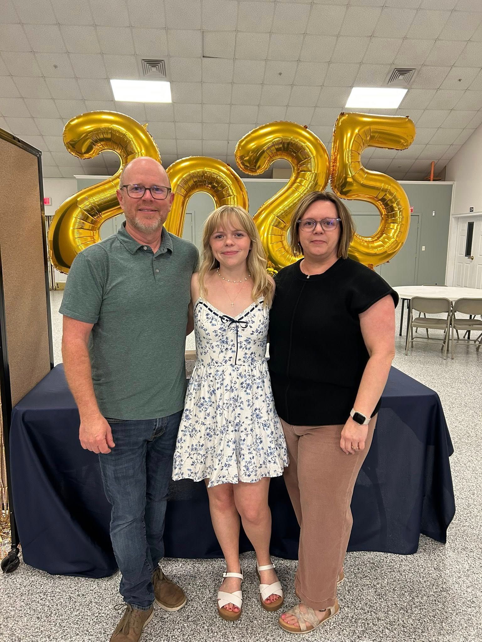 A group of people are posing for a picture together.