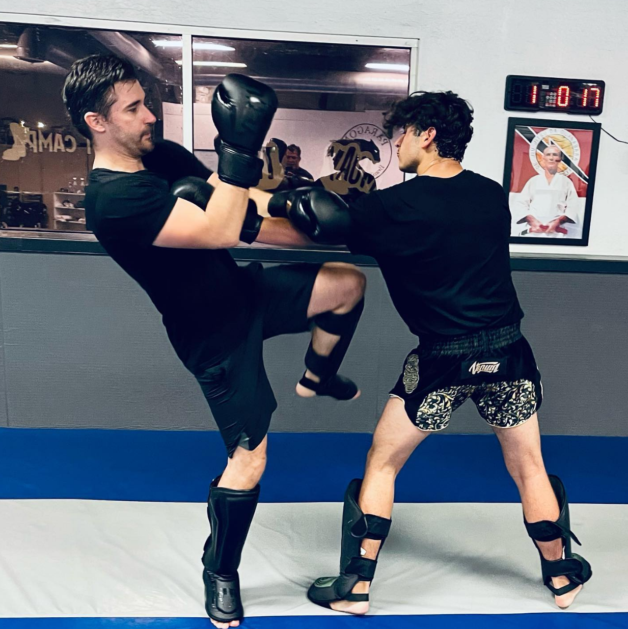 Adult students drilling Brazilian Jiu-Jitsu fundamentals at Paragon Simi Valley in Simi Valley, CA.