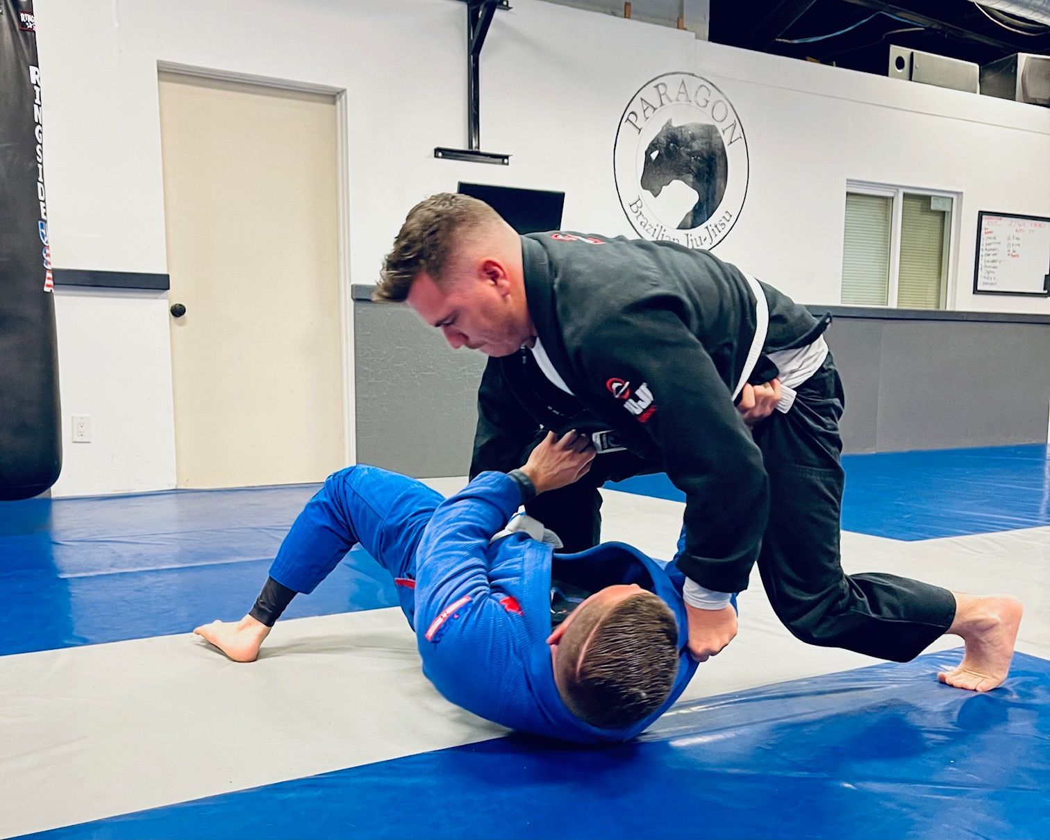 Beginners practicing brazilian jiu jitsu drills at Paragon Simi Valley in Simi Valley, CA for confidence and fitness.