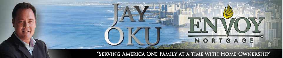 a man is standing in front of a banner for jay envoy mortgage