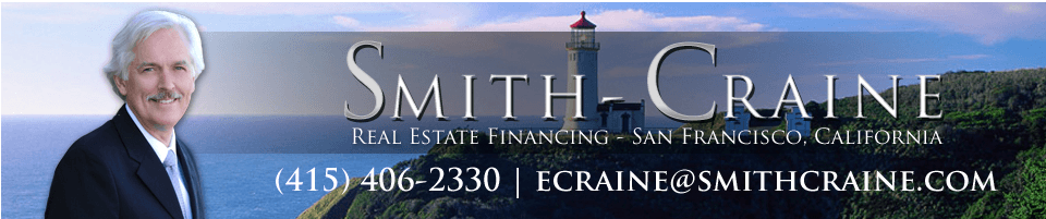 a man in a suit is standing in front of a cliff with the name smith-craine on it