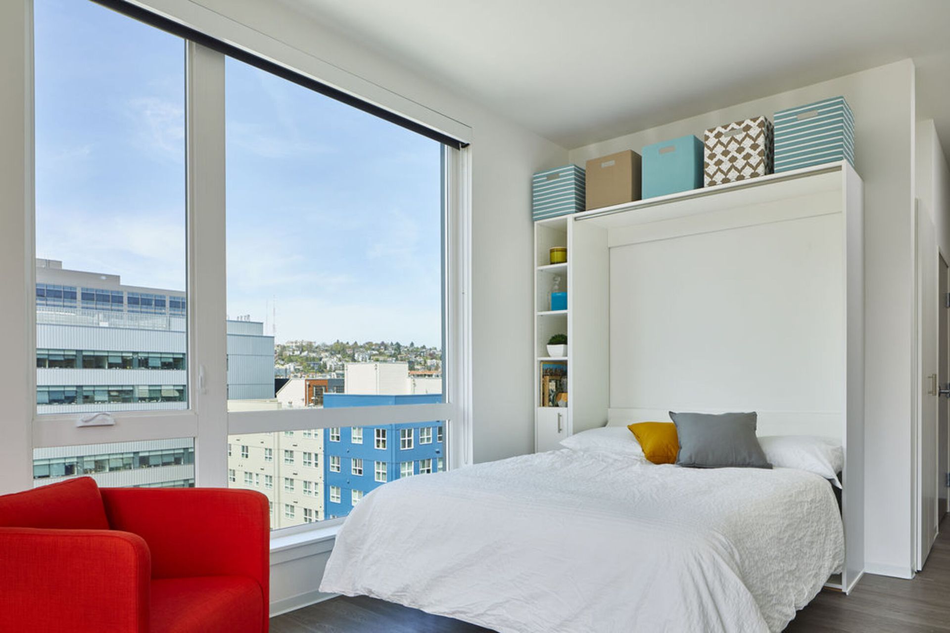 murphy bed photo with plenty of natural light coming through