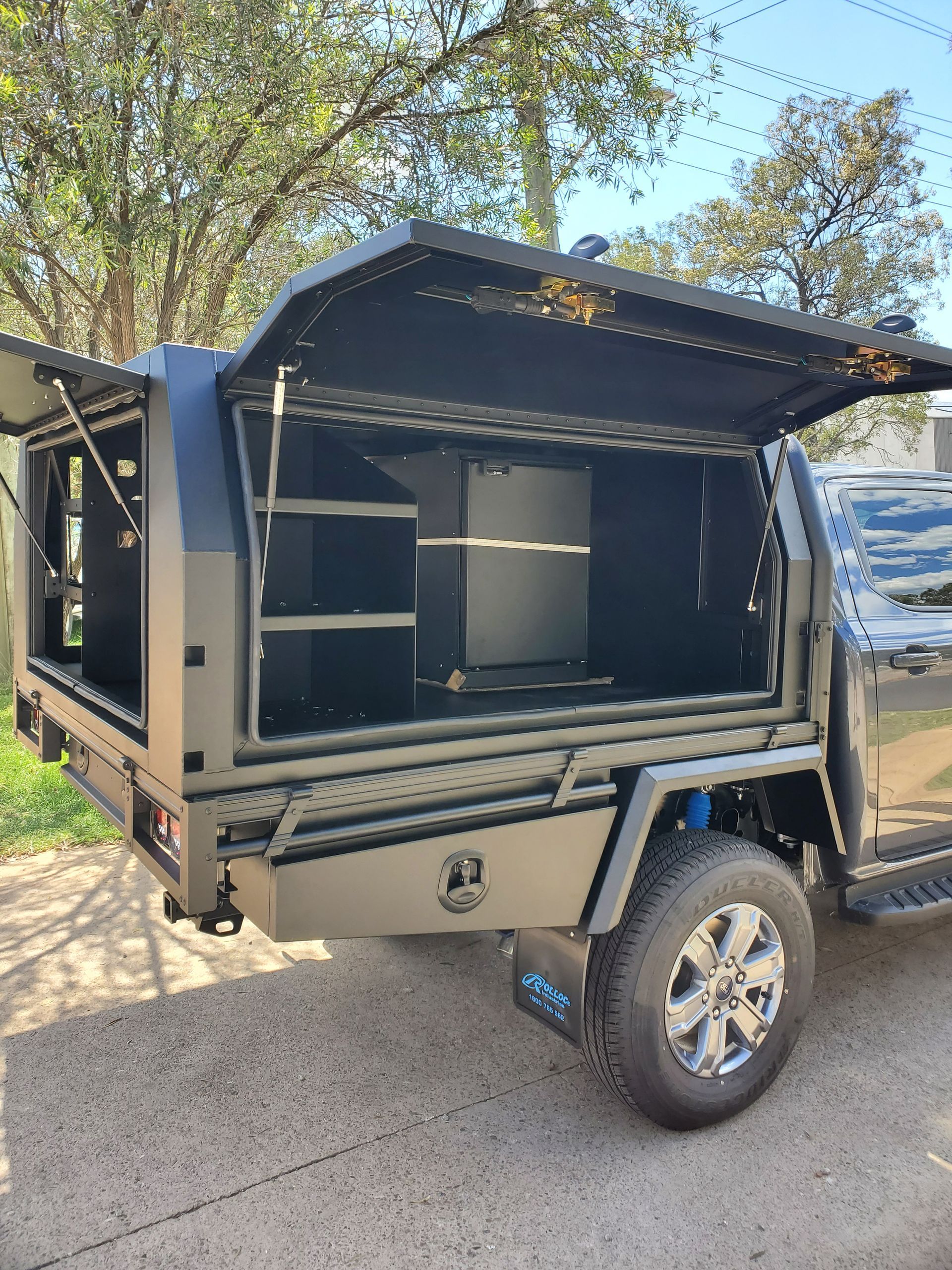 A Black Truck With The Canopy Open — Wilberforce, NSW — Rolloc Industries