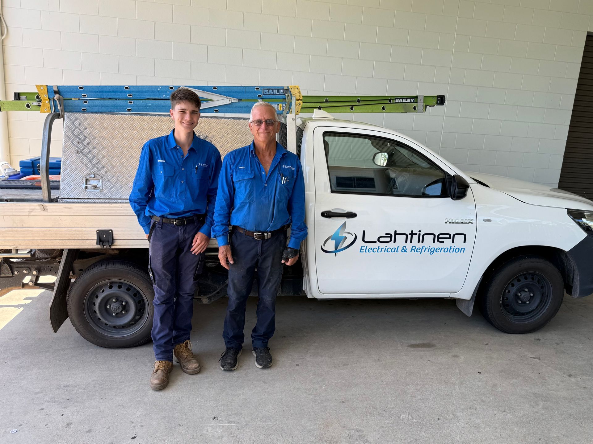 Men with Truck — Lahtinen Electrical And Refrigeration in Ingham, QLD