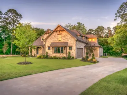 Seattle WA concrete contractors expertly installing a smooth, durable concrete driveway for luxury home
