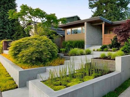 Stylish concrete retaining walls designed by Seattle's premier concrete company for landscape enhancement