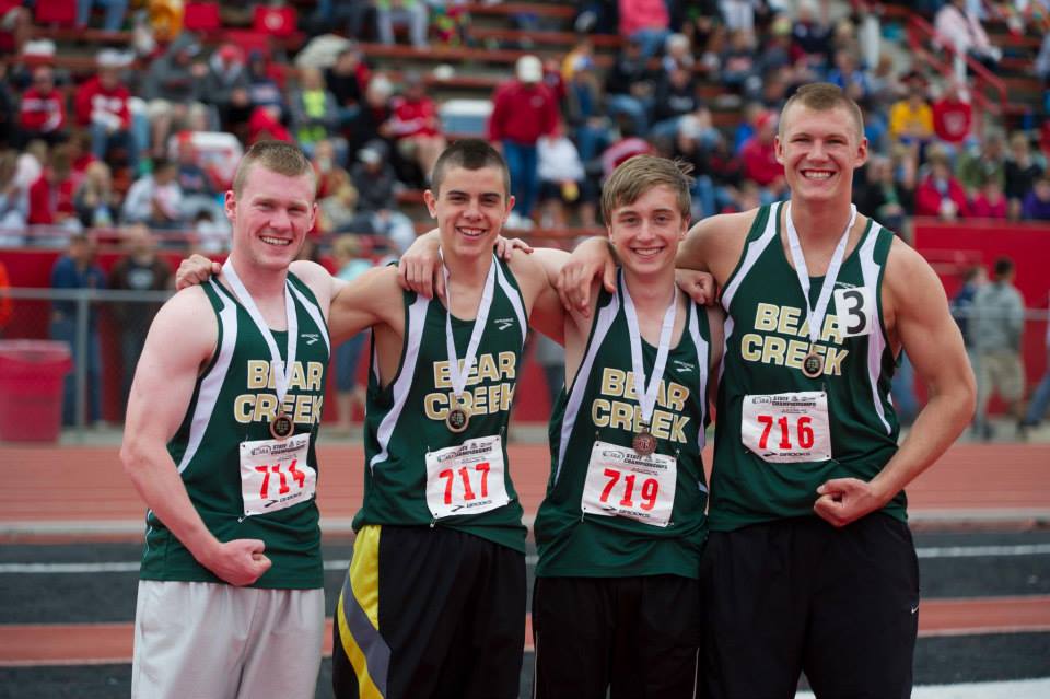 Four bear creek athletes are posing for a picture