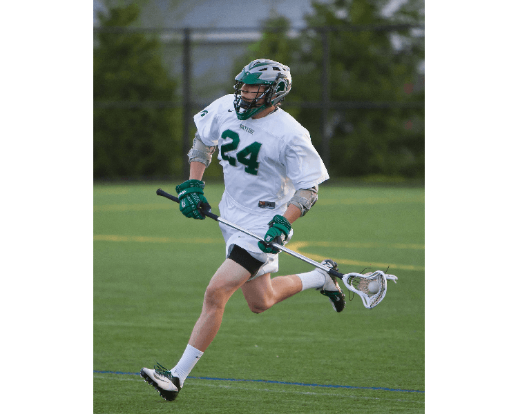 A lacrosse player with the number 24 on his jersey