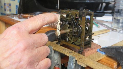 A Man Fixing A Clock — Buford, GA — The Clock Shop Inc.