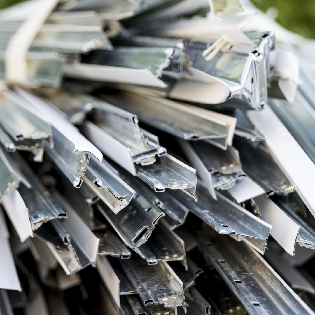 A man is polishing the side of a car with a machine