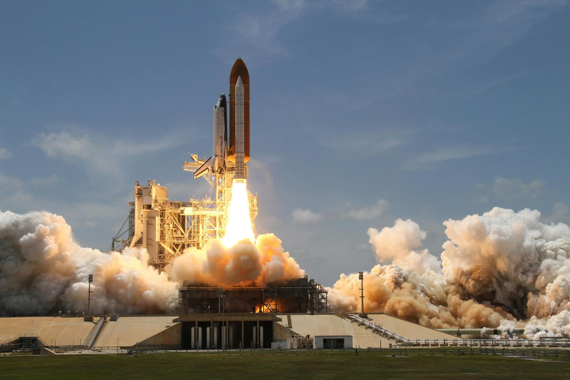 A space shuttle is being launched into space at NASA Space Centre