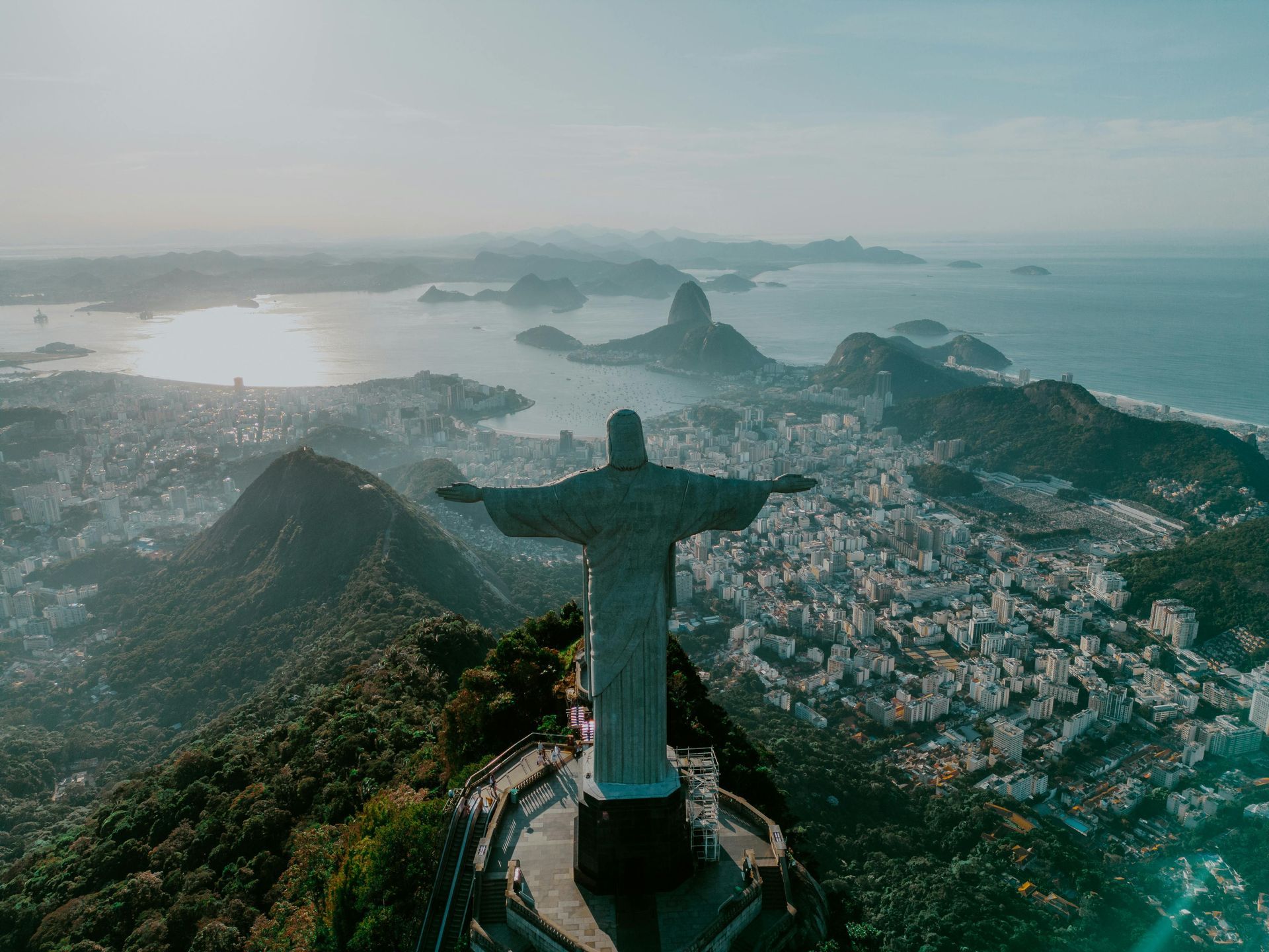 An aerial view of the christ the redeemer statue in rio de janeiro.