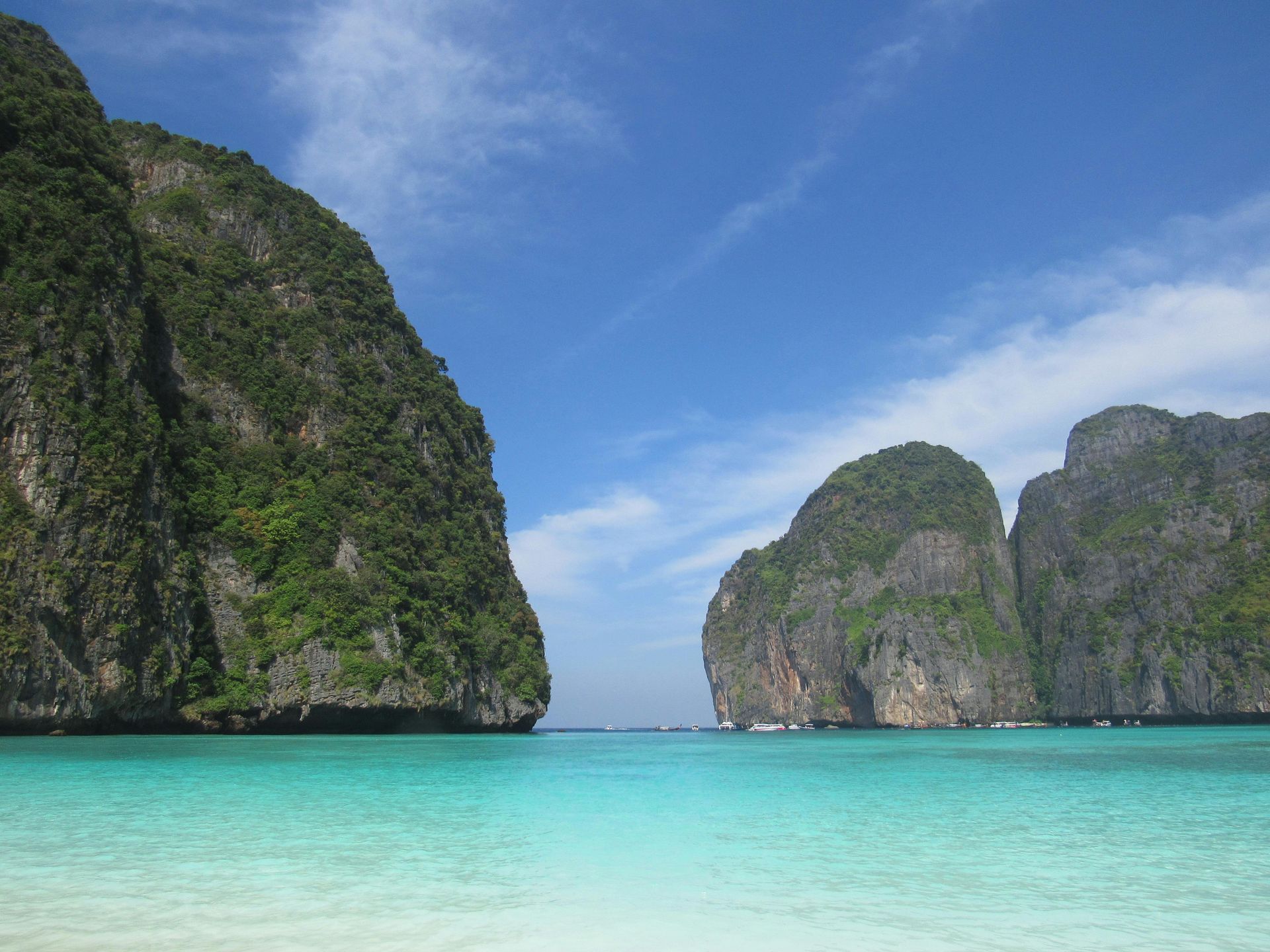 A large body of water with mountains in the background