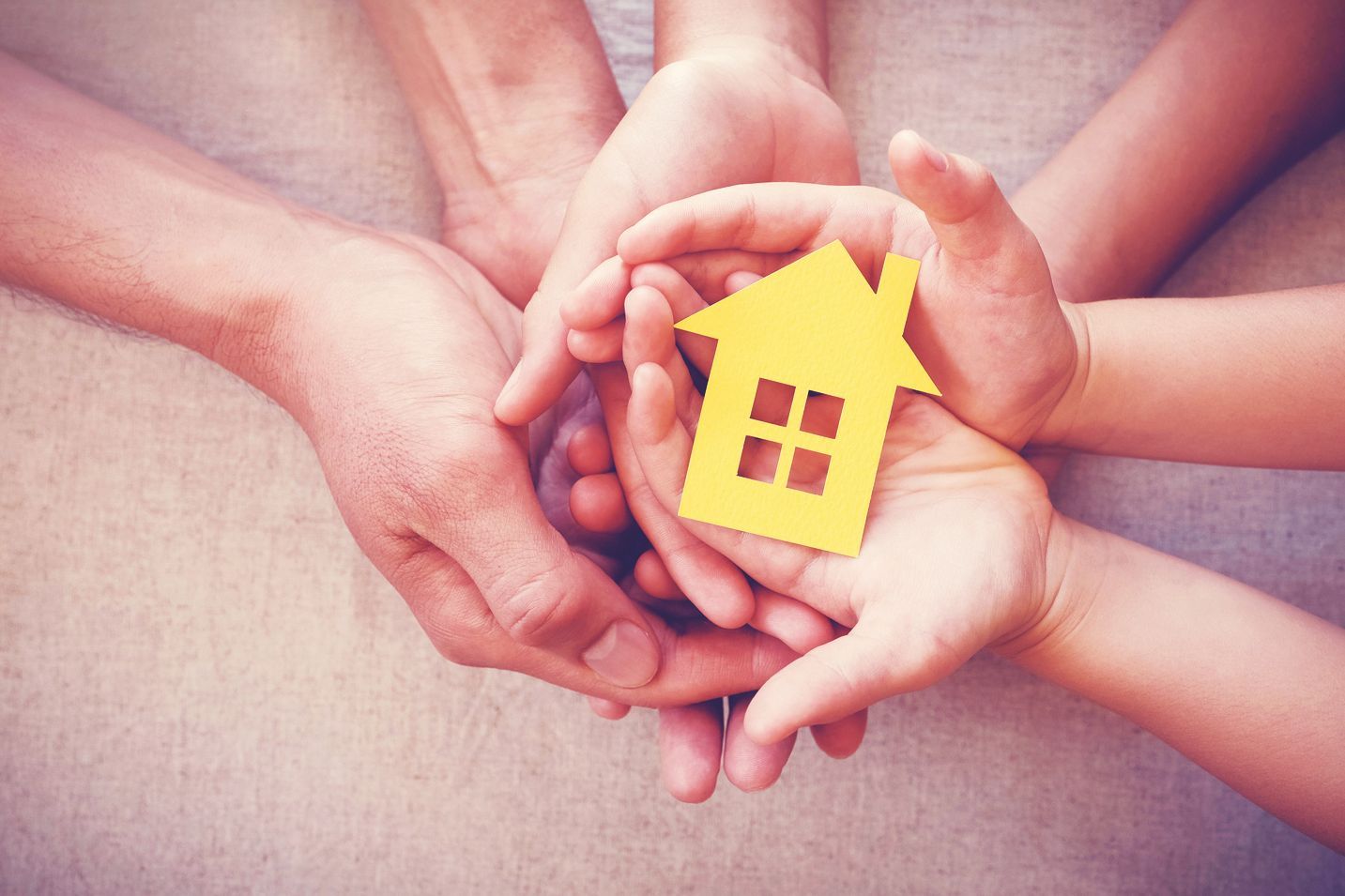 A large, weathered, vintage-style metal sign reading 