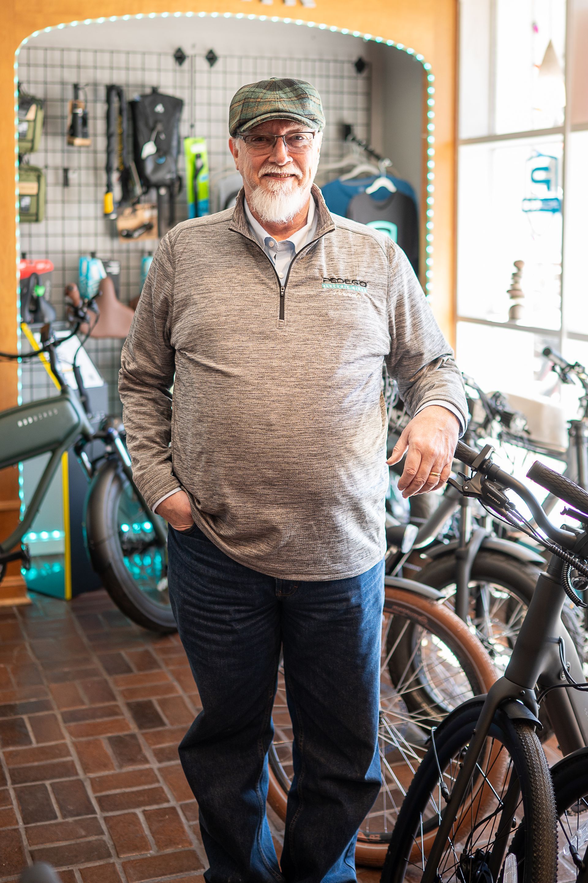 A large, weathered, vintage-style metal sign reading 