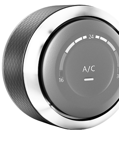 A black and silver a / c knob on a white background. | 19th Avenue Garage
