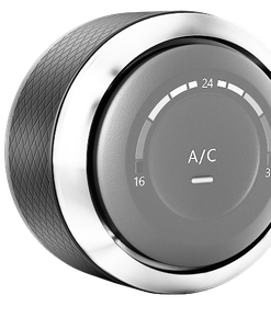A black and silver a / c knob on a white background. | 19th Avenue Garage